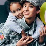woman with military uniform and young daughter