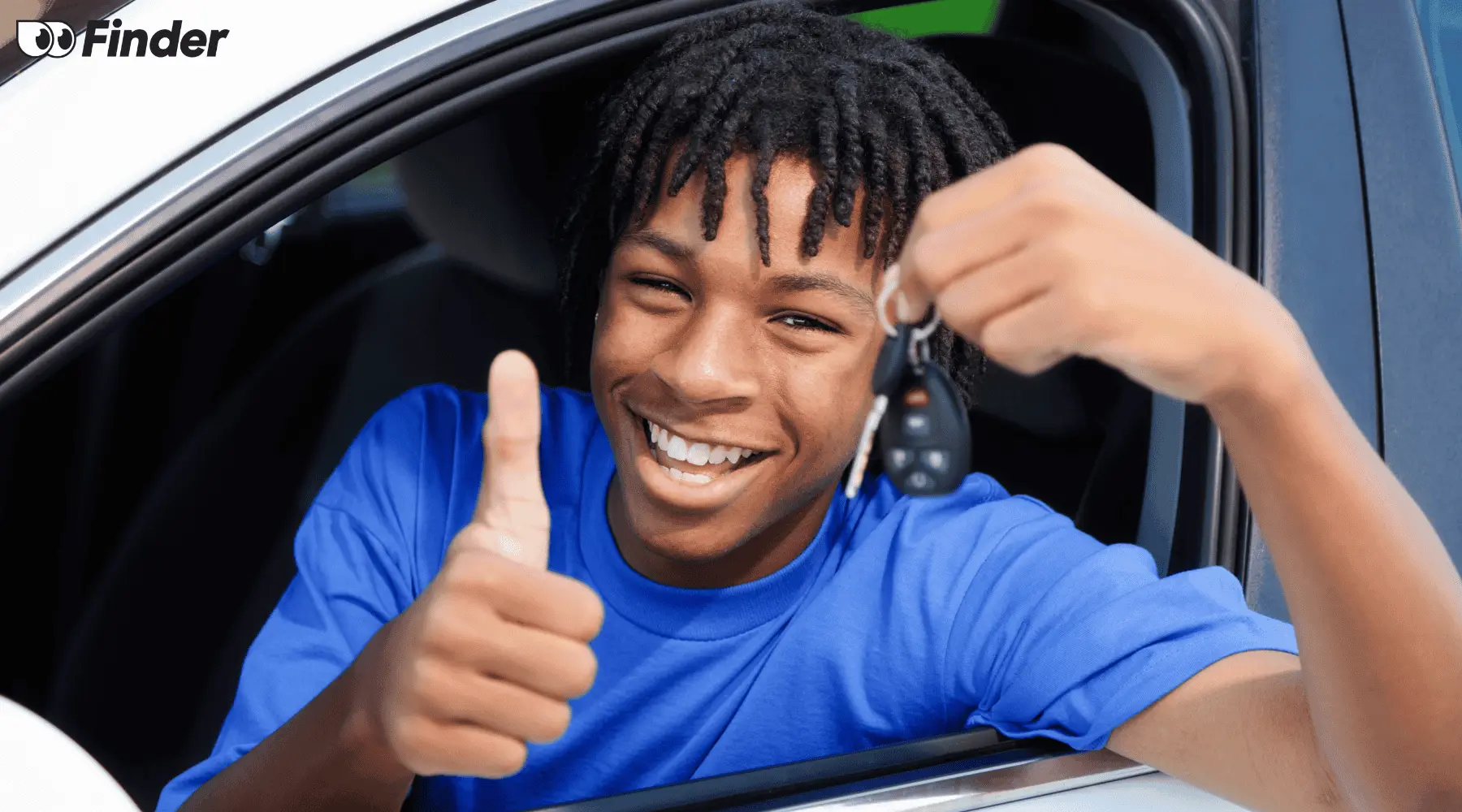 Teen driver showing off their car keys 