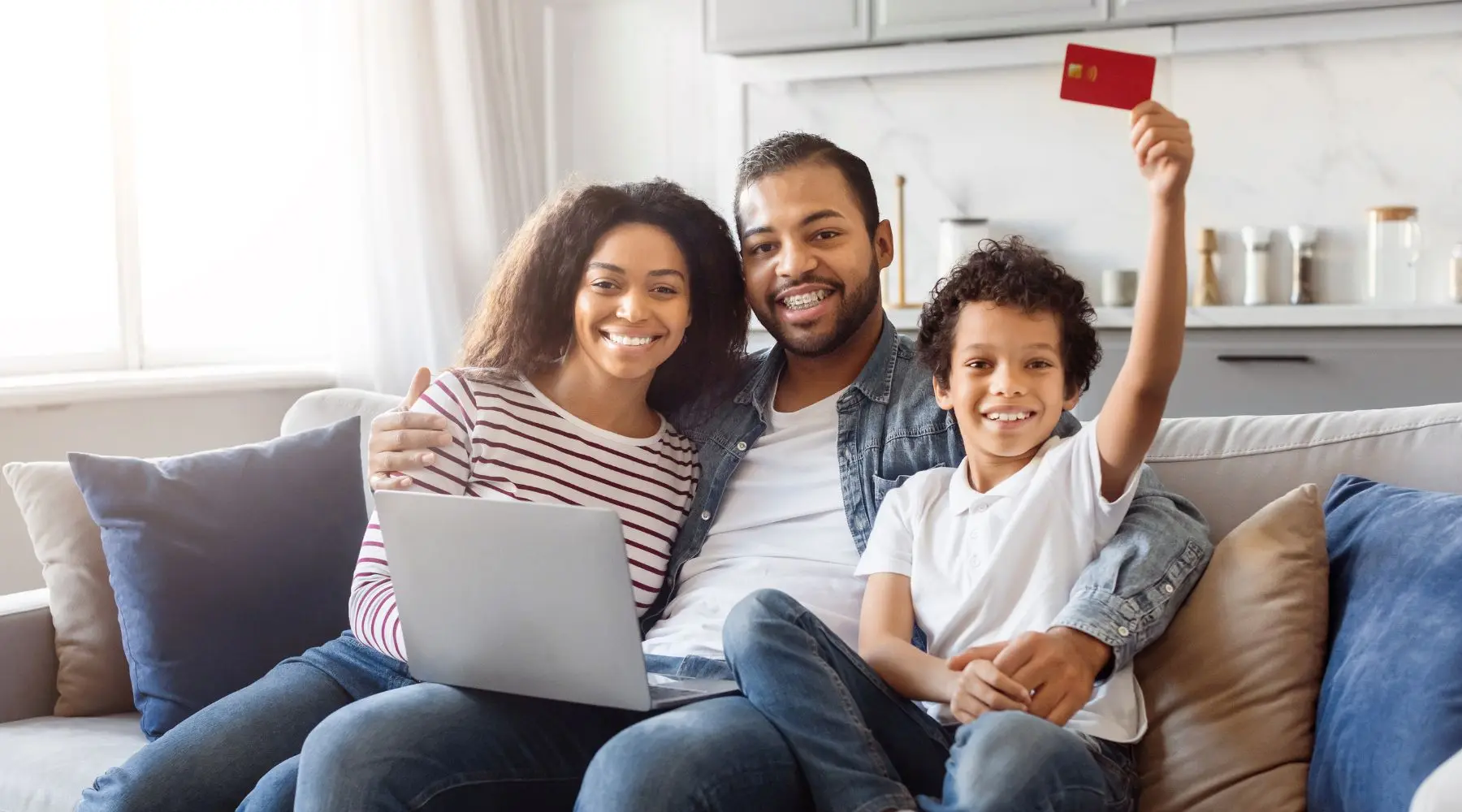 parent and kids with debit card