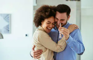 Woman and her boyfriend just bought their own house.