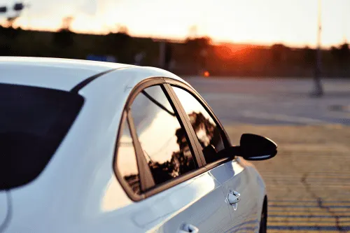 Car facing the sunset