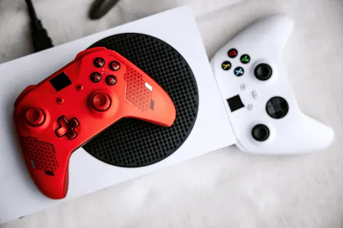 Red and white gaming controllers